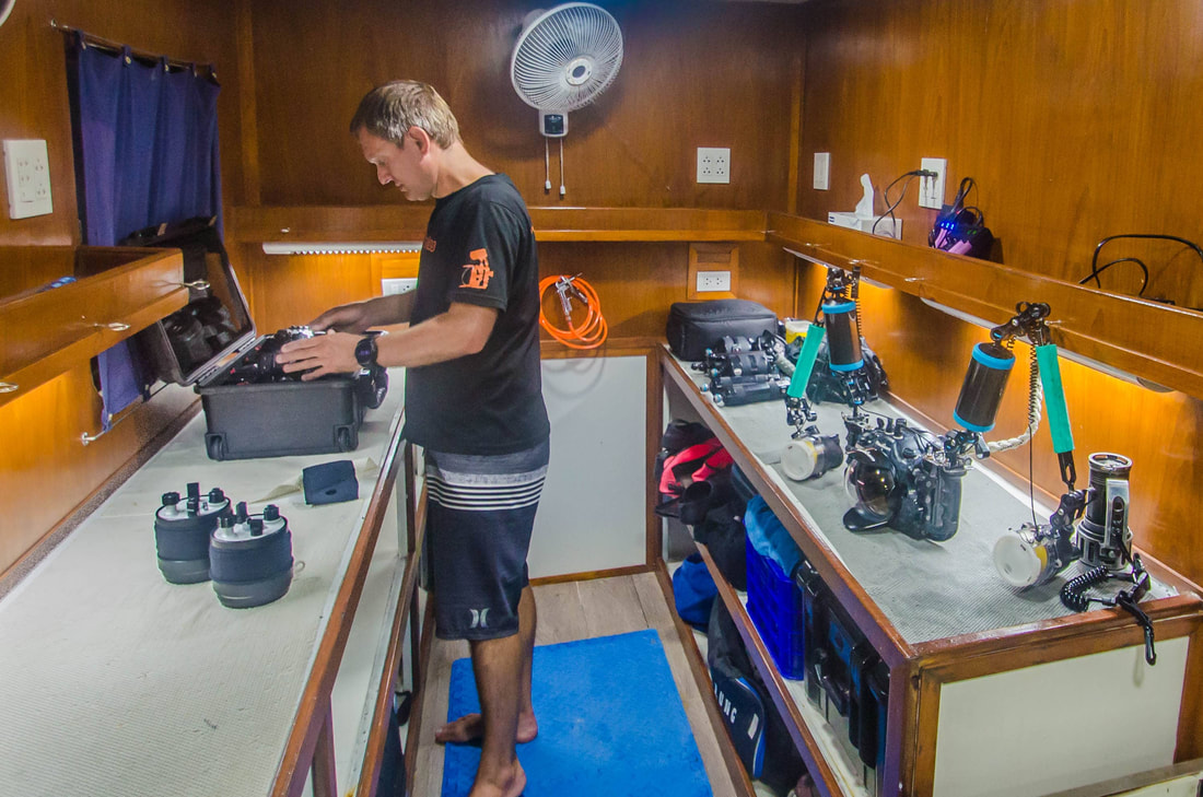 Underwater Photographer setting up on the MV Smiling Seahorse