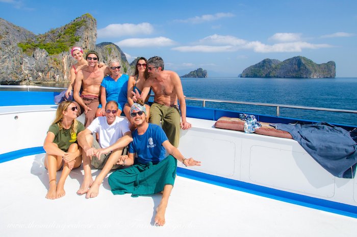 friends socialising on the sun deck of a diving liveaboard
